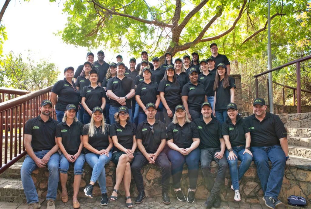 The Pack Leader Pet Products team photographed together outdoors
